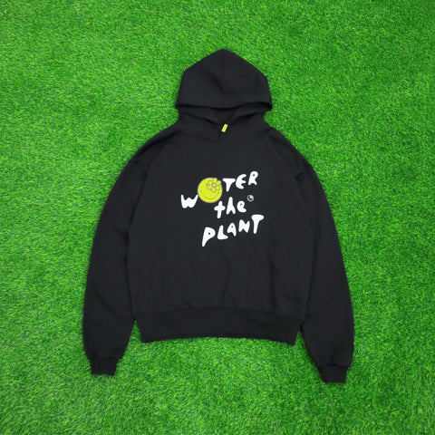 BREEZE HOODIE | BLACK, Long sleeve, Relaxed Fit, Drawstring Hood, Ribbed Trims, Yellow woven flag logo at the left sleeve, Collaboration with Smiley, Color: Black, Material: 100% Cotton