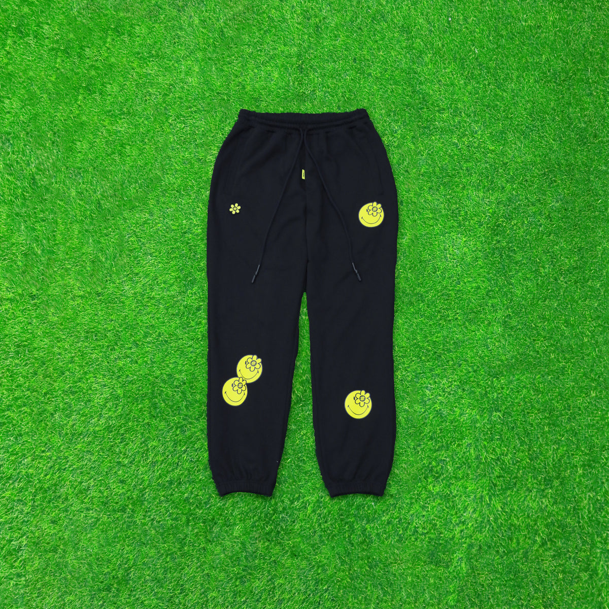 HIDENSEEK PANTS | BLACK, Elasticated and Drawstring Waist, 2 Side Pockets, Woven Brand Patch, Collaboration with Smiley, Color: Black, Material: 100% Cotton