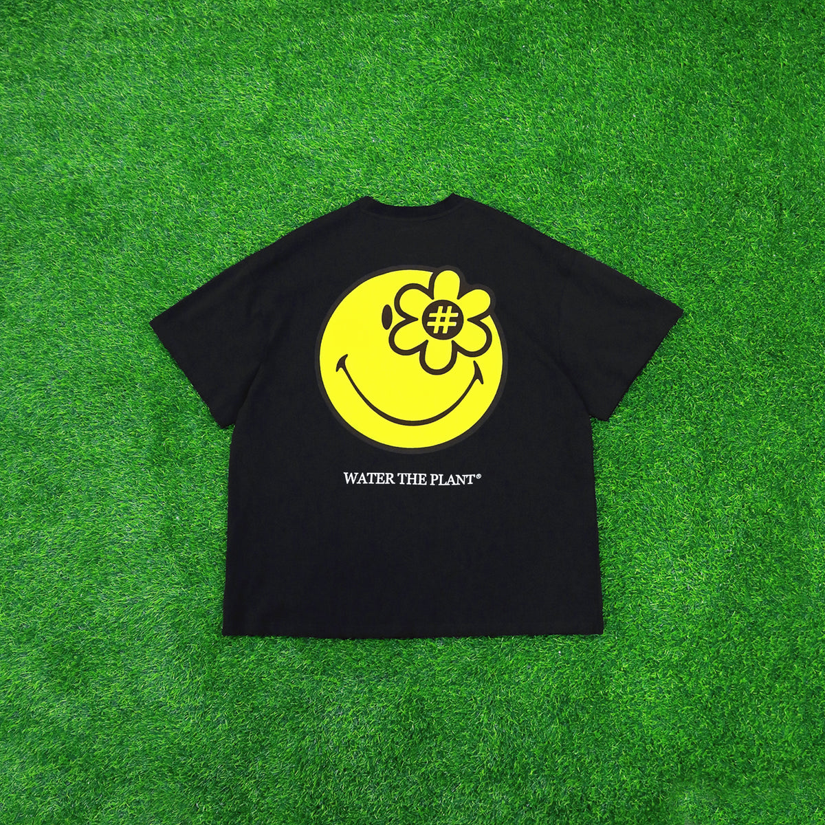 PLAYSAFE TSHIRT | BLACK, Short sleeve, Oversized Fit, Ribbed crewneck, Yellow woven flag logo at the left sleeve, Collaboration with Smiley, Color: Black, Material: 100% Cotton